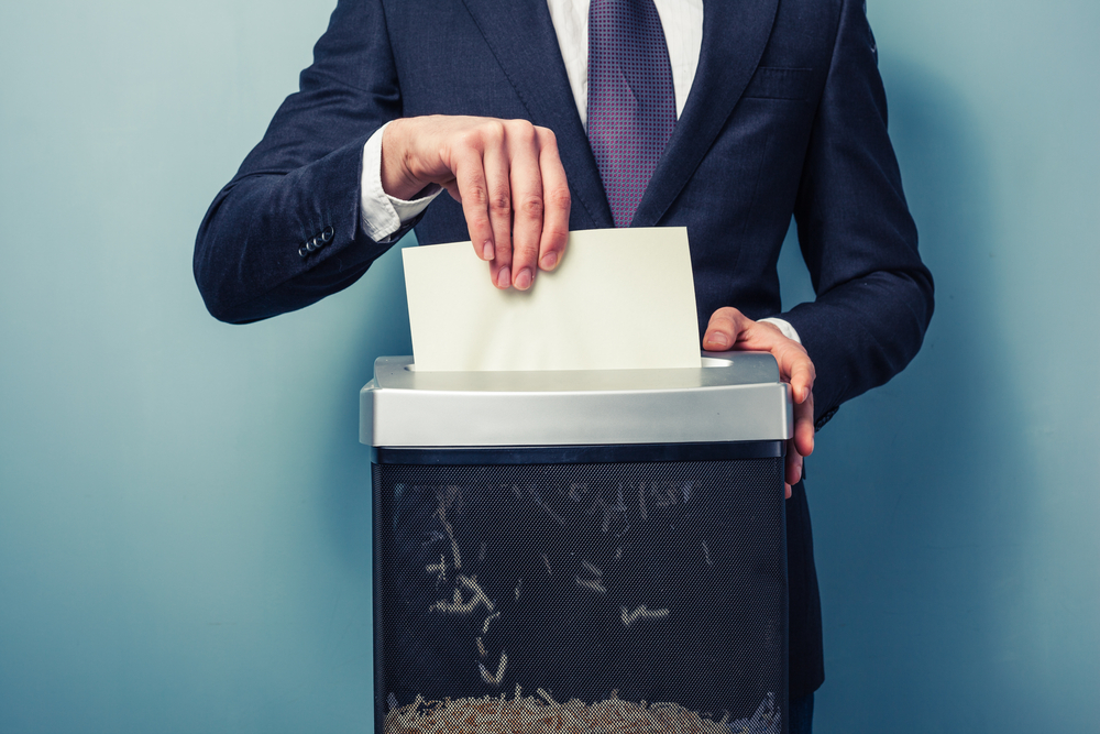 shredding old financial documents