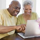 Older couple looking into investments