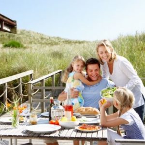 a family enjoying a meal and quality time together