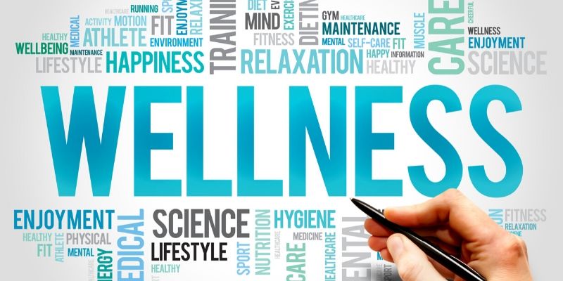 Health and Wellness Tips While Staying at Home - Graphic of words surrounding wellness and self-care.