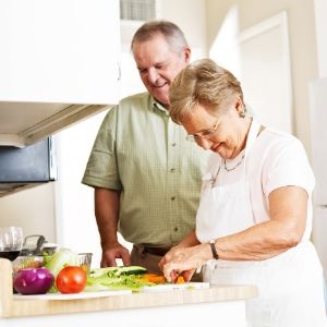 Couple make food together