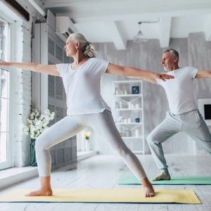 Yoga and stretching at home - 4 Self-Care Tips for Coping with Coronavirus Quarantine - Mission Wealth