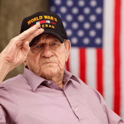 Veteran salutes at camera