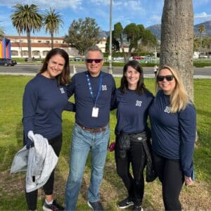 Dannell and Mission Wealth Team Volunteering at Santa Barbara Beach