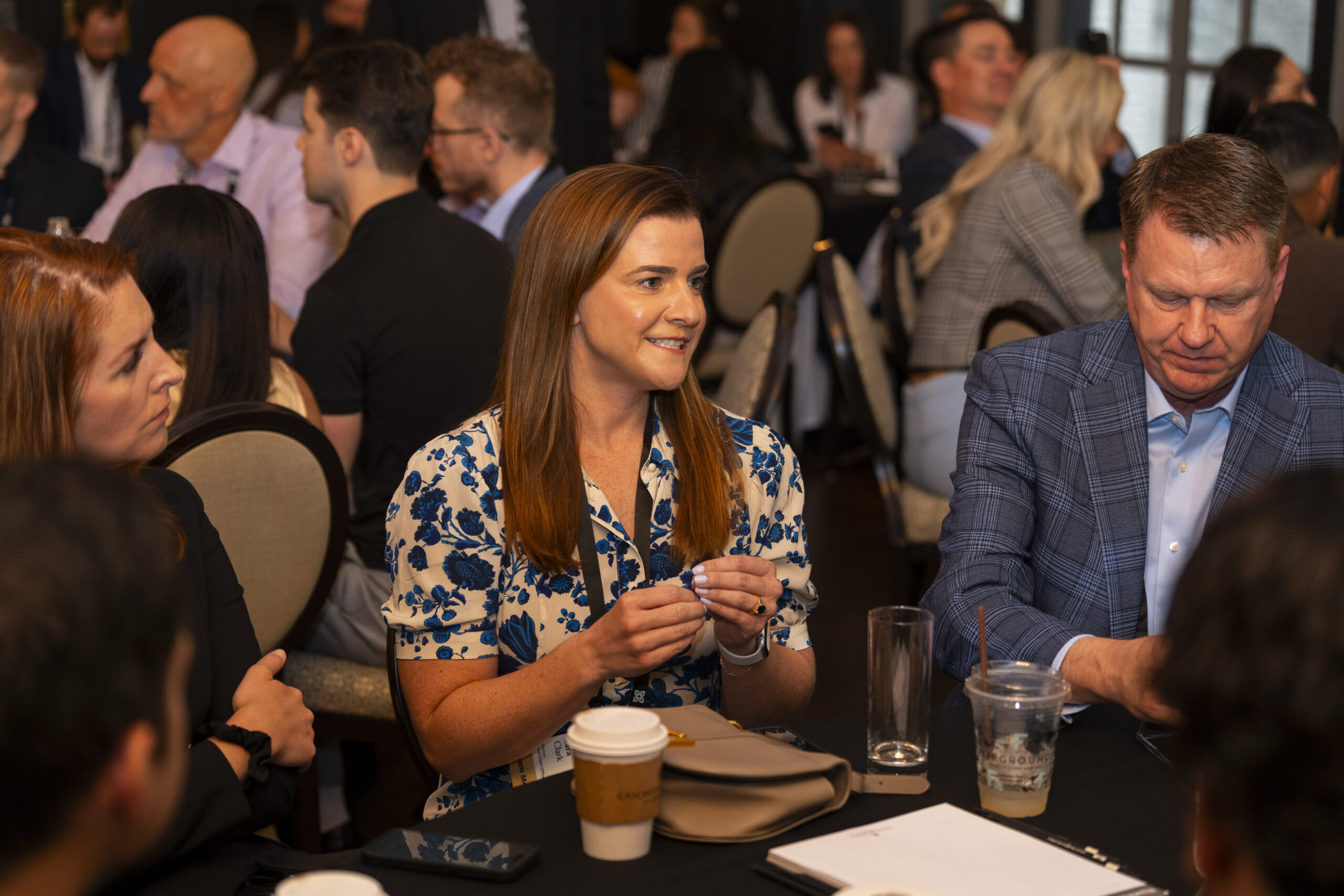 Sara Clark participates in a group discussion at a Mission Wealth event.