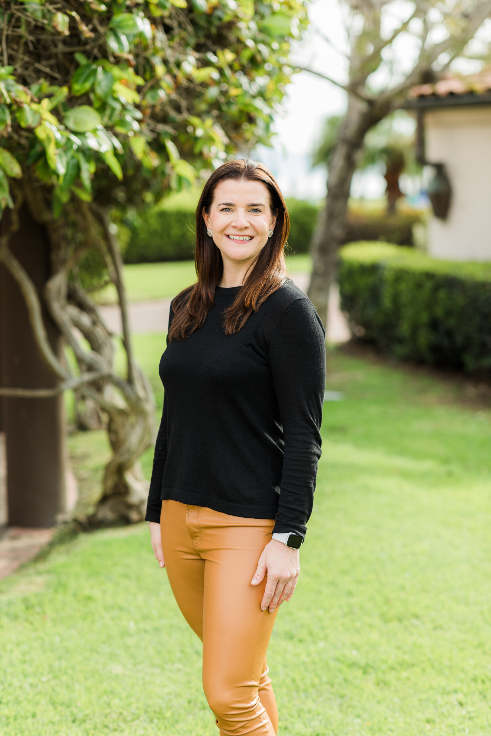 Professional outdoor portrait of Mission Wealth team member Sara Clark.
