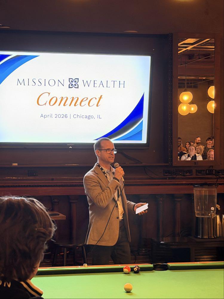 Matt Adams speaks to attendees during the Mission Wealth Connect event in Chicago.
