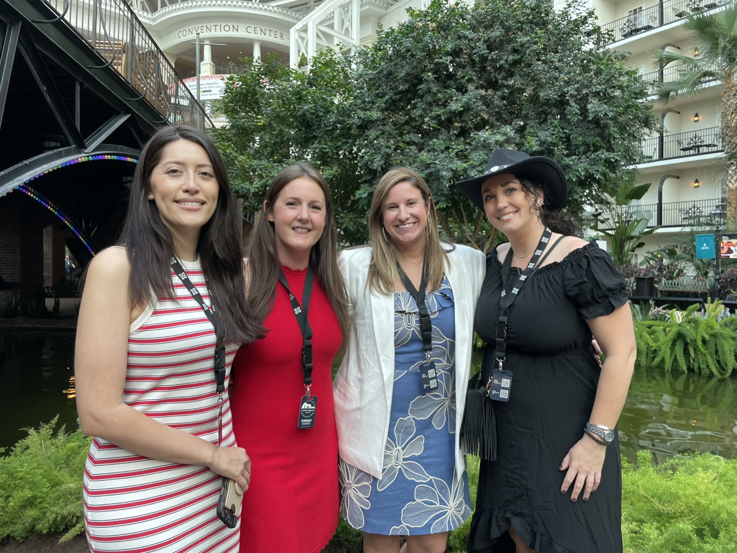Tina Kunze poses with Mission Wealth colleagues at a team event.