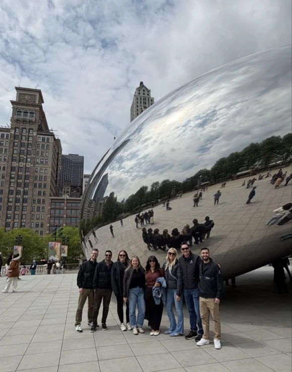 Michelle Winkles with colleagues at Cloud Gate in Chicago