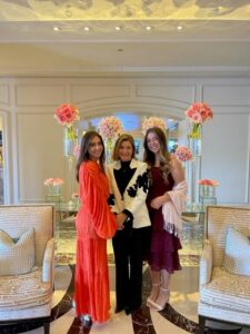 Leena, Claudia, and Nadia at a charity event.