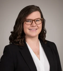 Professional portrait of Jessica Neves, a team member at Mission Wealth, showcasing her approachable demeanor and expertise.