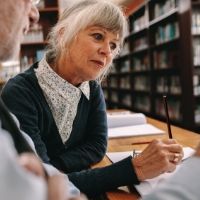 woman reviewing paperwork
