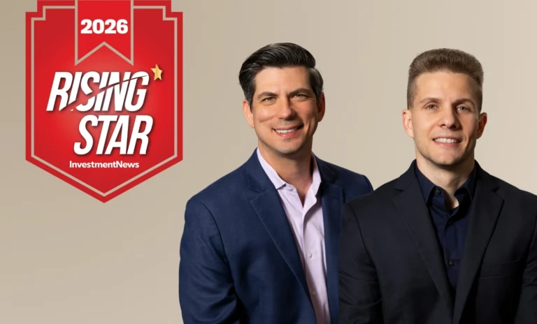 Andrew Kulha and Travis Dragan are featured as InvestmentNews Rising Stars 2026 in a professional portrait.